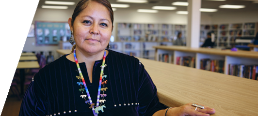 image of indigenous woman in library